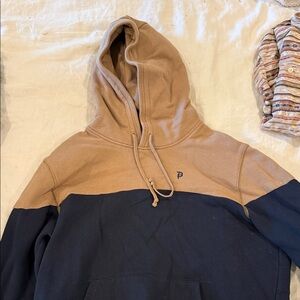 Primitive Two-Tone Hooded Sweatshirt in Tan and Black